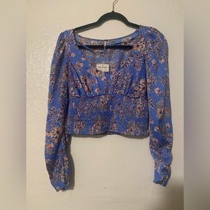 Free people top. Size small. Satin.